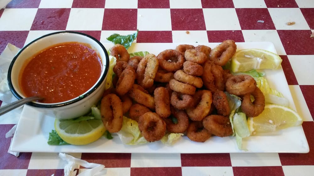Order Calamari Rings ￼ food online from Di Cicco's Italian Restaurant store, Fresno on bringmethat.com