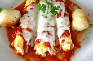 Order Manicotti Siciliano food online from Village Grill store, Lexington on bringmethat.com